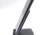 a cell phone that is sitting on a stand