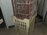 a stack of crates sitting on the floor in a room