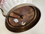 a clock that is sitting on top of a table