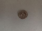 a small coin that is sitting on a table