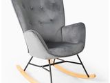 a grey rocking chair with wooden legs and a buttoned seat
