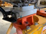 a close up of a machine that is in a warehouse