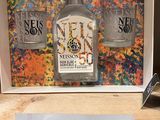 a picture of a bottle of liquor on display in a store