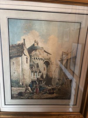 tableau encadré représentant un bâtiment avec une calèche