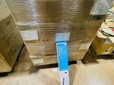 a box of boxes sitting on the floor next to a pile of boxes