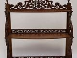 an image of a wooden shelf with two shelves on it