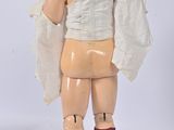 a plastic figure of a man with a white shirt and red socks
