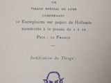 an old book with a drawing of a man ' s face on it