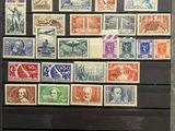 a display of stamps on the wall of a museum