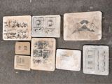 many different types of coasters sitting on the floor