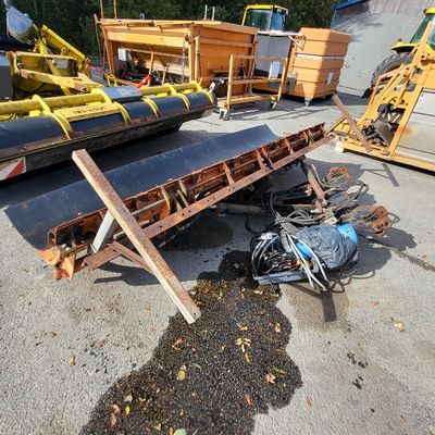 a pile of machinery that is sitting on the ground