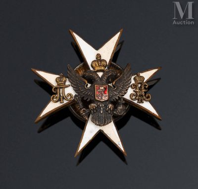 a close up of a badge on a black surface