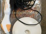 a white and orange electric hair dryer next to a black and white hair dryer