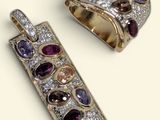 pair of diamond, amethorate, and garnett earrings