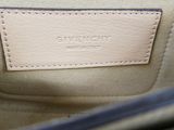 the inside of a bag with a leather label on it