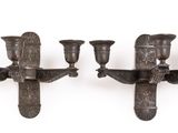 pair of antique wall sconces in the shape of a candelabra