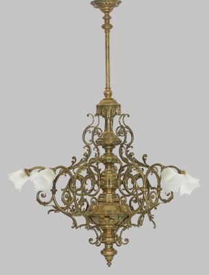 an image of a chandelier with three white flowers hanging from it