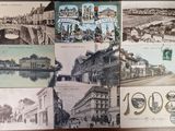 many old postcards that are on the table