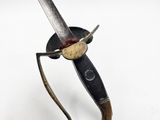 a knife that is on top of a stand
