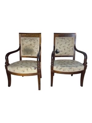 pair of antique chairs with upholstered upholstered back and arms