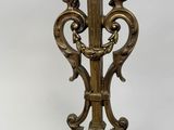 an antique brass plate with a clock on top of it
