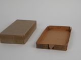 two boxes that are sitting next to each other on a table