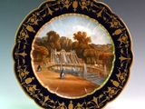 a plate with a picture of a castle on it
