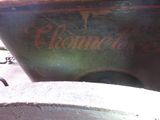 a close up of a large metal container with a sign on it
