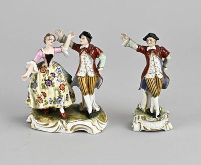 pair of figurines of a man and a woman dancing