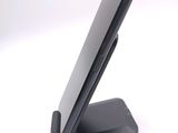 a cell phone that is sitting on top of a stand