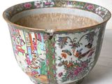 a bowl with a design on it sitting on a table