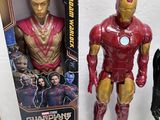 two action figures of iron man and captain america in a box