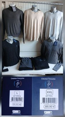 a lot of sweaters on display in a store