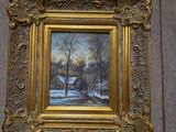 une photo d'un tableau accroché au mur