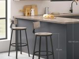two stools sitting in front of a counter in a kitchen