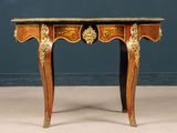 a small table with a marble top on it