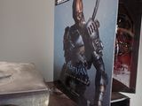 a box with a batman figure on it and a box with a batman figure on it