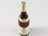 a bottle of wine that is sitting on a table