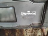 a close up of a car ' s front bumper with the word noruto on it