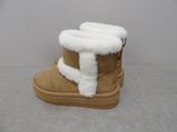 a close up of a pair of boots with fur on them
