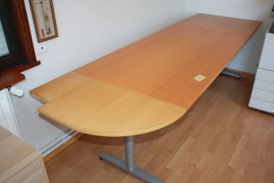 an image of a desk in a room with wood floors