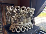 a white crown that is sitting on a table