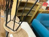 many chairs and tables in a room with boxes on the floor