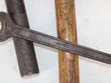 two tools that are laying next to each other on a table