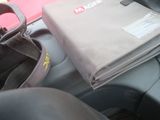 a bag sitting on top of a seat in a car