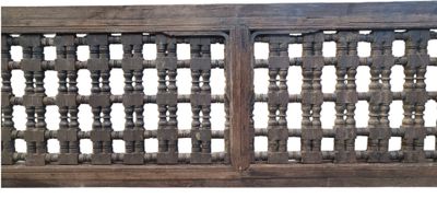 an image of a wooden window with a lattice design on it