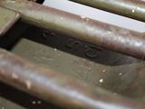 a close up of a piece of metal that has been rusted