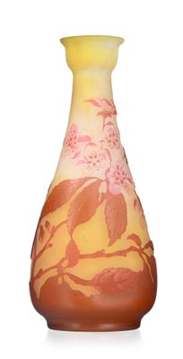 a vase with a floral design on it on a white surface