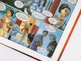 a comic book with a comic strip in the middle of it