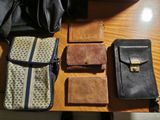 many different types of purses on the table